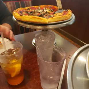 a pizza and drinks