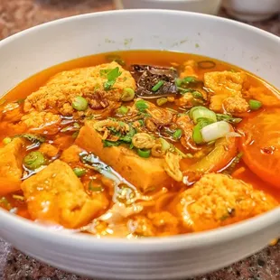 a bowl of soup on a table