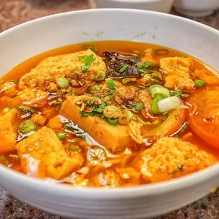 a bowl of soup on a table