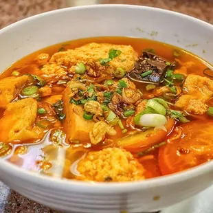a bowl of soup on a table