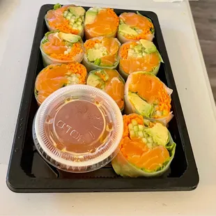 a tray of sushi rolls