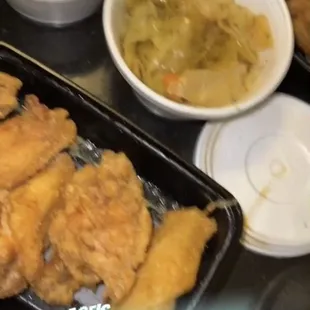 Blackened shrimp ( grilled shrimp smothered in Alfredo sauce) Mac and cheese was really good actually and fried chicken and cabbage