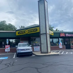 a car parked in front of a restaurant