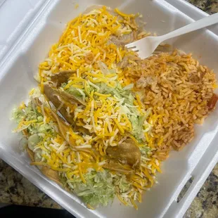 a meal in a styrofoam container