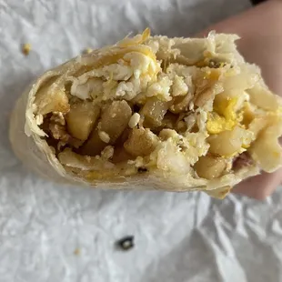 Random weird unidentifiable pieces of black char in the burrito