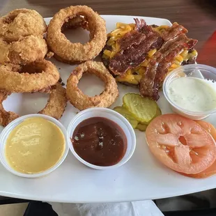 Bacon burger (asked for no bun, onions, lettuce &amp; substituted grated cheddar for the American cheese) &amp; onion rings