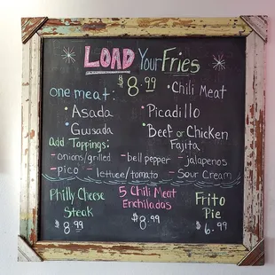 a chalk board with a menu on it