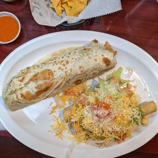 Three rolled Tacos and a carne asada burrito.