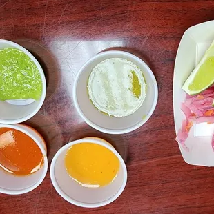 Top left is spicy good  The tacos are very flavorful by themselves. There is very little need for salsas.