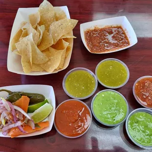 Complimentary chip and salsa and endless sauce and pickled snacks