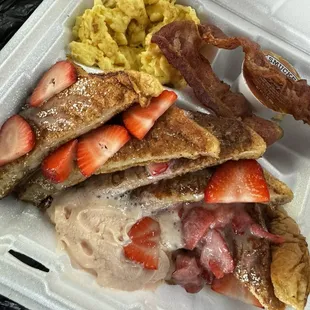 Strawberry cream French toast. All brunch platters come with eggs and bacon