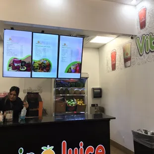 a woman behind the counter