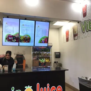 a woman behind the counter