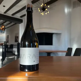 a bottle of wine on a table