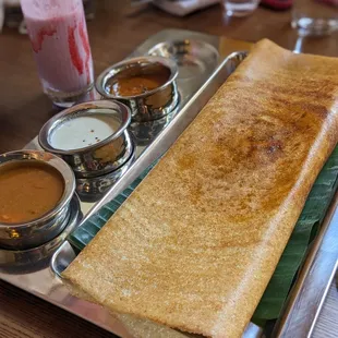 The chicken masala dosa was perfectly cooked and absolutely gigantic. The condiments were also very tasty.