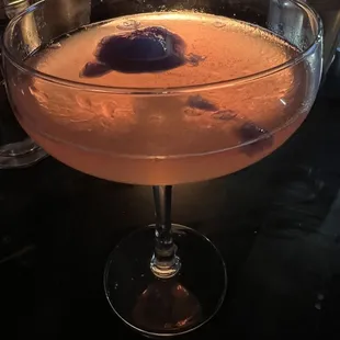 a cocktail in a coupe glass