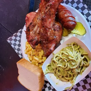 Riblets, sausage, leg quarter, Mac and cheese and green spaghetti...
