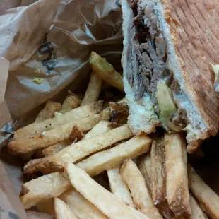 Tri tip torta + fries.  Bread is perfectly crunchy and steak is well sliced.