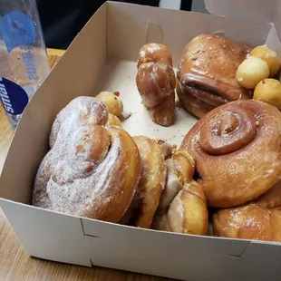 a variety of doughnuts in a box