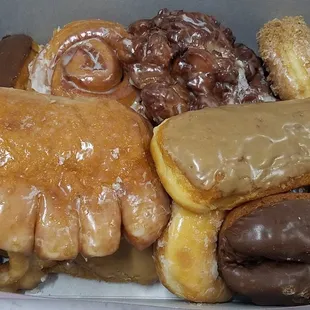 a variety of doughnuts in a box