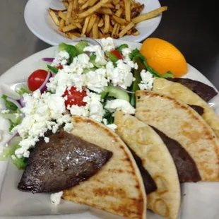 Grecian Platter with gyro or chicken gyro.  Served with onions, tomato cucumber sauce, pita bread, Greek salad with soup 9.99