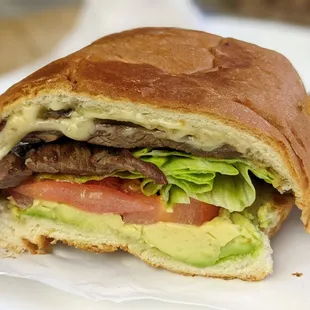 Asada Torta, the asada was flame grilled but too tough as 1 giant slab of meat.