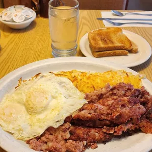 Corned Beef Hash w/pair overeasy eggs, hash browns, and whole wheat toast ($16.95, 9/27/23)