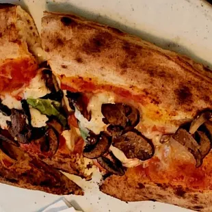 Toppings on the outside of the Calzone? ... yuck!