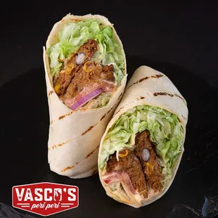 Veg Samurai
Options of chipotle bean patty, paneer, or falafel in either a plain or spinach wrap; romaine lettuce, tomato, red onion