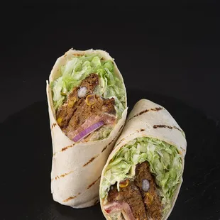 Veg Samurai:Options of chipotle bean patty, paneer, or falafel a plain or spinach wrap; romaine lettuce,tomato,onion, samurai&amp; garlic sauce