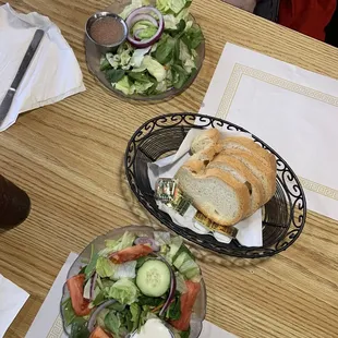 Salad &amp; bread. Their salad has more than just iceburg lettuce.
