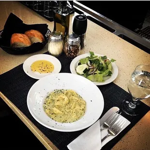 Pasta : Ravioli cheese or meat comes with side salad