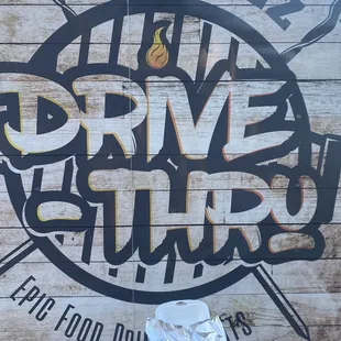 a person holding a hot dog