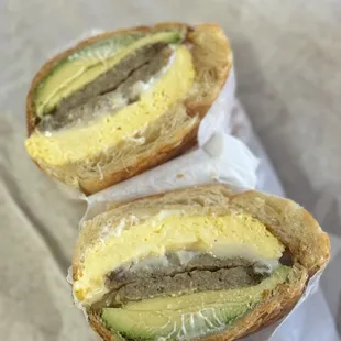 Eggs, sausage, avocado croissant sandwich The best!!