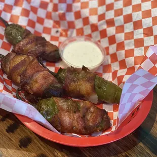 Bacon Wrapped Jalapeño poppers devilishly delish and spicy as fuck ;)....