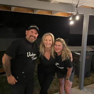 Shaun, Heidi and the new home owner celebrating.