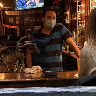 Bartender was rude and wouldnt serve patrons wearing a mask and following all guidelines.