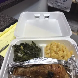 a meal in a styrofoam container