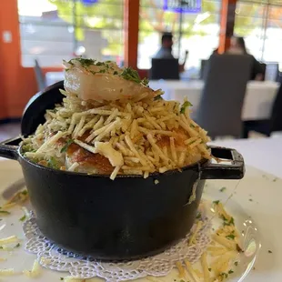 Mini Crispy Fries topped on Cheesy Shrimp Rice