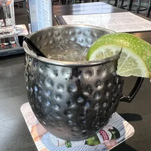 a moscow mule with a lime wedge in it