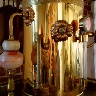 Old school espresso machine on display.