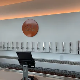 a row of taps on a wall