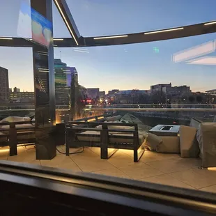 The view (with a little reflection)  can't wait to see this place once the weather is warm!