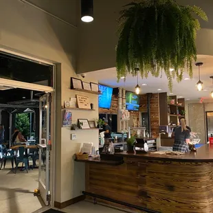 a view of the bar and dining area