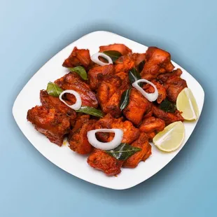 a plate of chicken wings