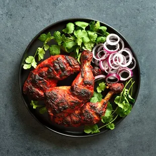 a plate of grilled chicken