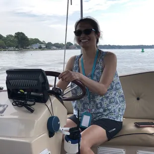 My sister playing Captain of the boat aka birthday celebrant