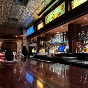 people sitting at the bar