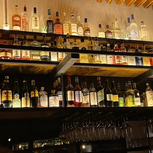 a variety of liquor bottles on shelves