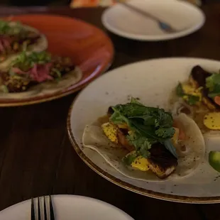 Salmon tacos (front); pork belly tacos (rear).